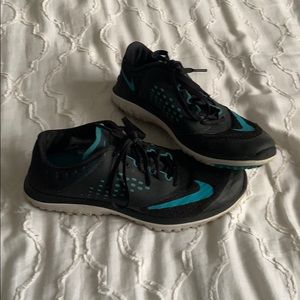 Black and baby blue nike sneakers